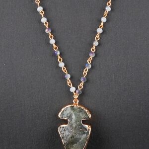 Beaded Necklace Featuring Crafted Beads and a Stunning Pendant Design